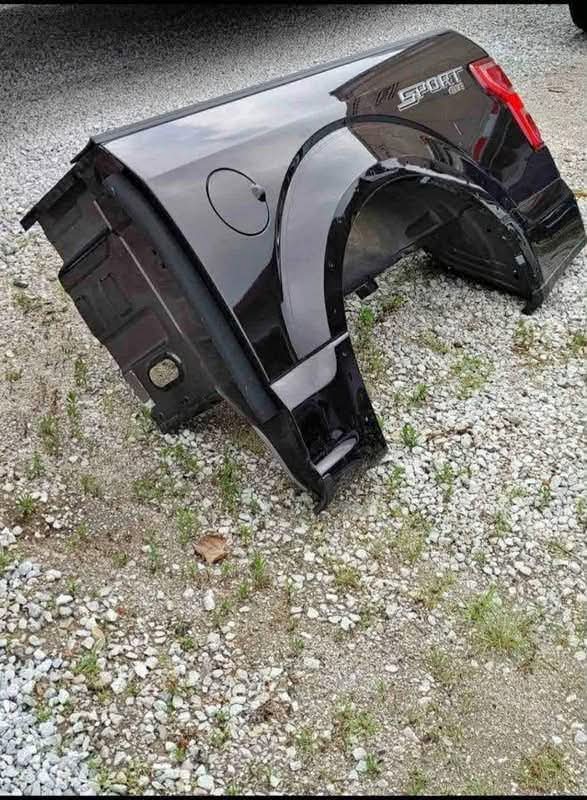 A quarter panel 2015–2020 Ford F-150 L/S (driver side) quarter panel for 5’5” box, with tail lights.