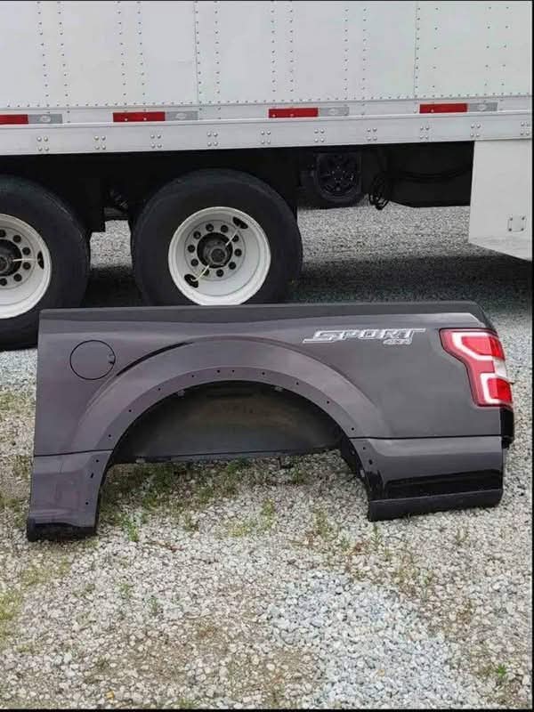 A quarter panel 2015–2020 Ford F-150 L/S (driver side) quarter panel for 5’5” box, with tail lights.