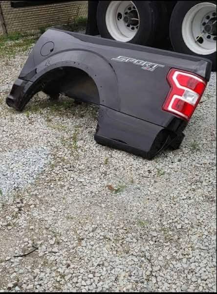 A quarter panel 2015–2020 Ford F-150 L/S (driver side) quarter panel for 5’5” box, with tail lights.