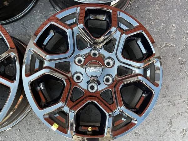 2024 Ford F-150 OEM 18" factory black wheels — set of four.