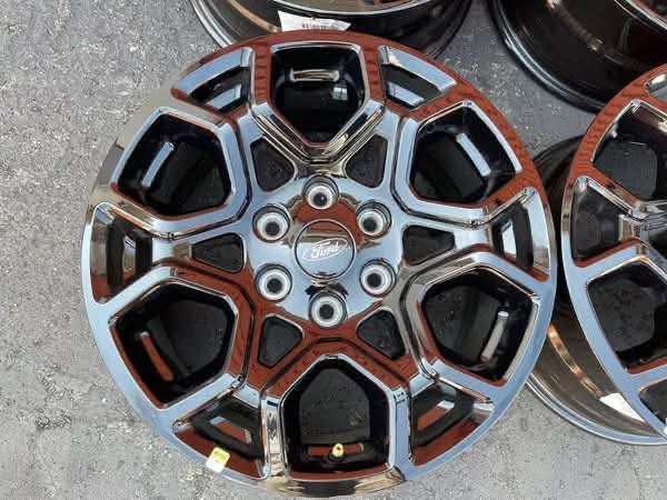 2024 Ford F-150 OEM 18" factory black wheels — set of four.